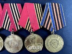 Soviet Russian Set of 25 medals and badges of Veteran WW2 USSR Army. Document