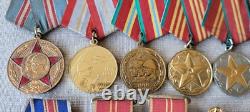 Ensemble de 23 médailles militaires, de travail et jubiliaires soviétiques russes de l'URSS. Description