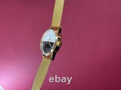 Montre vintage Raketa 24h automatique poignet homme russe soviétique URSS Sputnik jour