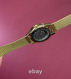 Montre vintage Raketa 24h automatique poignet homme russe soviétique URSS Sputnik jour