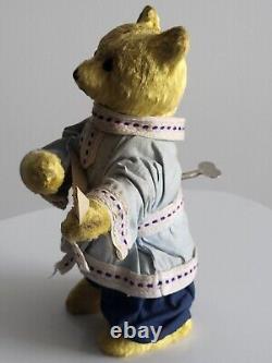 Ours en peluche mécanique des années 1960 de l'URSS russe soviétique avec balalaïka et clé