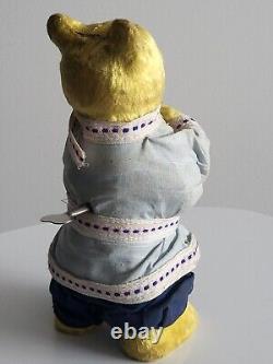 Ours en peluche mécanique des années 1960 de l'URSS russe soviétique avec balalaïka et clé