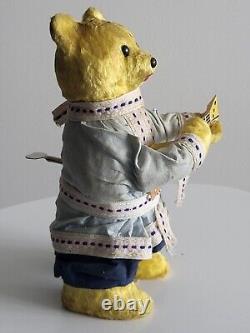 Ours en peluche mécanique des années 1960 de l'URSS russe soviétique avec balalaïka et clé